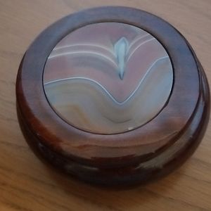 Small round container with decorative lid